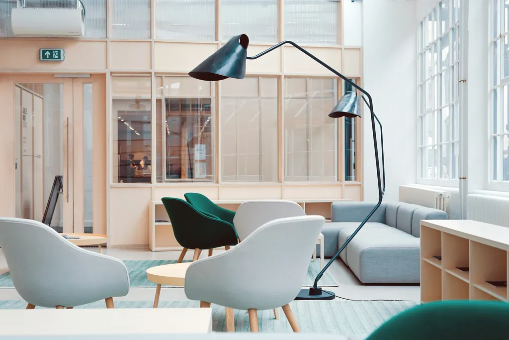 Modern commercial interior with clean seating and soft lighting — illustrative context only